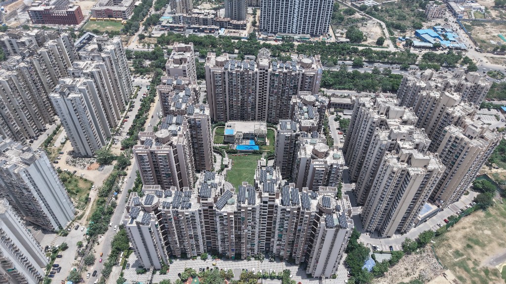 Wide aerial view of Arihant Arden with solar installation